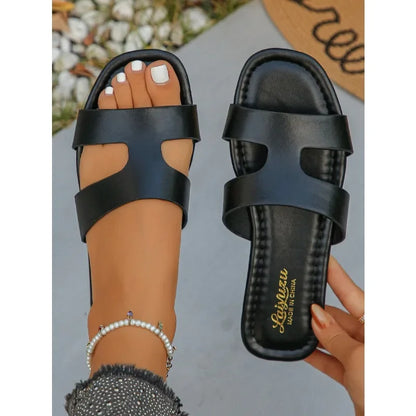 Sandalias planas tipo mule de mujer con tira única y corte calado, ajuste ancho, de PU, sin talón, antideslizantes, con suela fina, ideales para el verano, viajes a la playa y tallas grandes.